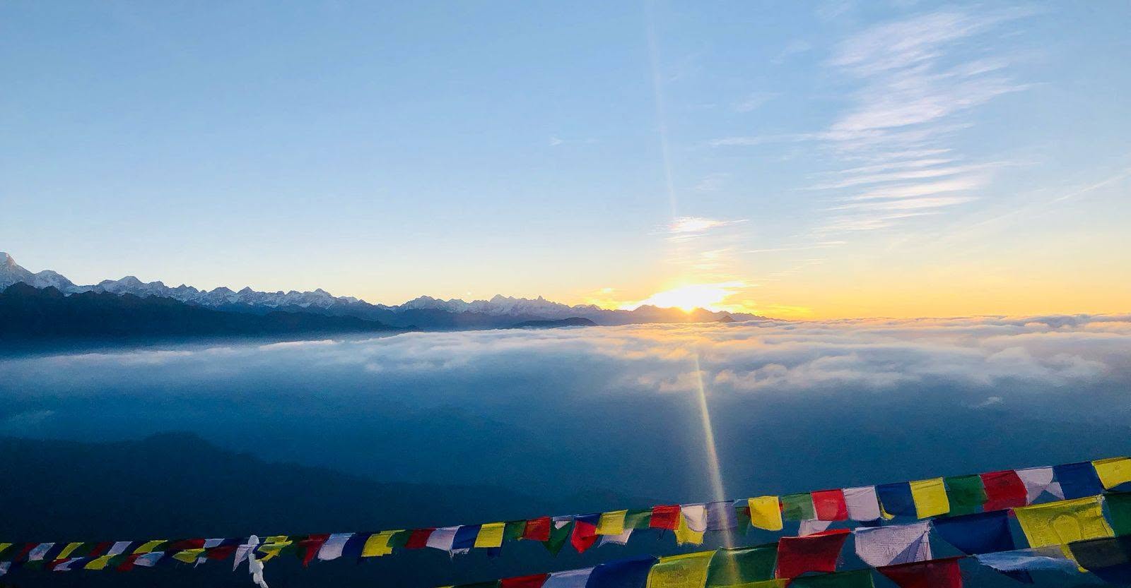 Golden sunrise light on the Himalayan peaks seen from Ama Yangri summit